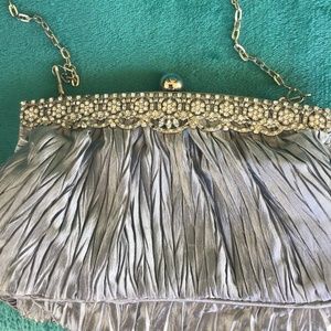 💚 3/$25 Silver clutch purse with crystal accents and long silver chain